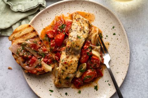 This one pan recipe is warm, cozy, and perfect for busy weeknights! Toss a frozen bag of The Better Fish® Tuscan Herb Butter Barramundi into a baking dish with tomatoes, shallots, red pepper flakes, and plenty of garlic for a delicious, Mediterranean-inspired meal that’s perfect with some toasted sourdough bread. Recipe and photography by Jessie… Continue reading Tuscan Herb Barramundi with Roasted Tomatoes Baked Barramundi Recipes, Barramundi Recipes, One Pan Recipe, Frozen Bag, Fish Dinner Recipes, Pan Recipe, Low Calorie Dinners, Sourdough Bread Recipe, Fish Dinner