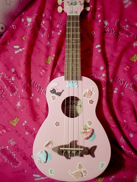 Stickers and bad lighting,,still cute though Painted Ukulele Aesthetic, Ukulele Aesthetic, Void State, Painted Ukulele, Baby Cartoon Characters, Pink Guitar, Paint Inspo, Guitar Painting, Music Instrument