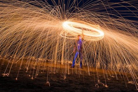 Fire Spinning with Steel Wool – A Special Effects Tutorial Bulb Photography, Fire Spinning, Steel Wool Photography, Manual Photography, Photography Cheat Sheets, Photography School, Long Exposure Photography, Digital Photography School, Light Trails