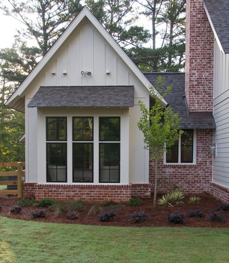 Longstreet - Farmhouse - Exterior - Atlanta - by New River Building Co. | Houzz Garage With Brick Accent, Picture Window Front Of House, Board And Batten Chimney Exterior, Brick Trim Exterior, Brick Wainscoting Exterior Farmhouse, Brick Skirting House Exterior, Partial Brick House Exterior, Bay Window Farmhouse, Timber Cottage