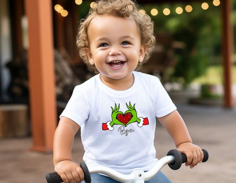 Personalized Grinch Heart Hands Toddler Short Sleeve Tee|Grinch Toddler Tees|Christmas ToddlerTees|Grinch|Personalized Grinch Tees Baby Christmas Shirt, Grinch Heart, Toddler Christmas Shirt, Grinch Shirt, Christmas Pajamas Kids, Grinch Shirts, Christmas Shirts For Kids, Diy Toddler, Christmas Tree Shirt