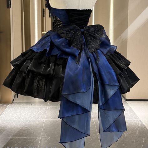 Black and Dark Blue Princess Dress with Sweetheart Neckline, featuring side lace-up detail decorations at the waist and elastic back for a comfortable fit. Adorned with 2 front bows at the waist and multiple layers of fluffy skirt, complete with butterfly ribbons embellishment.  Ideal for special occasions, such as weddings, parties, or themed events, this dress exudes a charming and elegant vibe. The sweetheart neckline offers a touch of delicacy, while the decorative elements like the butterfl Lace Butterfly, Jumper Skirt, Lolita Dress, Xl Dress, Princess Dress, Dresses Xs, Pretty Dresses, Pretty Outfits, Blue Dresses