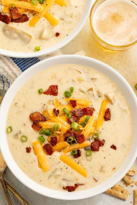 This Crockpot potato soup is rich and creamy, loaded with toppings like bacon and cheese, and is easy to make in the slow cooker! Slow Cooker Cream Of Potato Soup, Loaded Potato Gnocchi Soup, Loaded Potato Soup Slow Cooker, Slow Cooker Potato Bacon Soup, Slow Cooker Creamy Potato Bacon Soup, White Bean And Potato Soup, Easy Loaded Potato Soup Crock Pots, Slow Cooker Loaded Baked Potato Soup, Croc Pot Fall Recipes