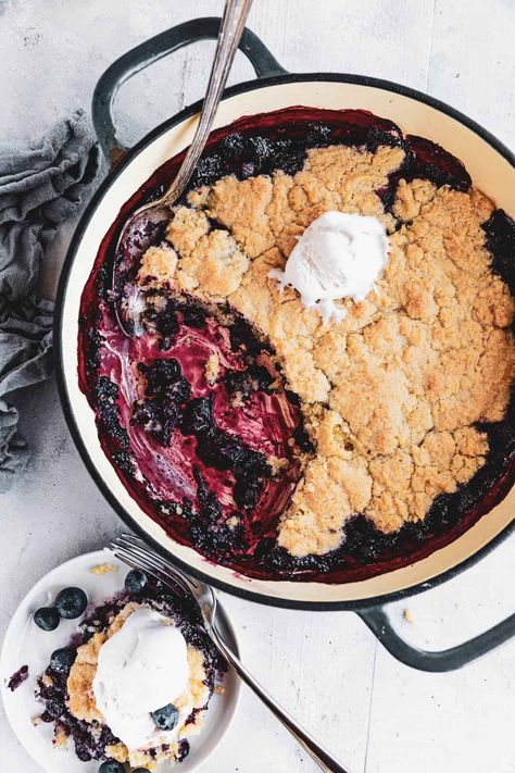 A delightfully easy summer dessert, this comforting Blueberry Rhubarb Cobbler features fresh blueberries and rhubarb, spiked with lemon, and baked with a sweet, buttery topping! Rhubarb Cobbler Recipes, Vegan Blackberry Cobbler, Mixed Berry Cobbler, Easy Blueberry Cobbler, Rhubarb Cobbler, Blueberry Rhubarb, Cobbler Topping, Berry Cobbler, Blackberry Cobbler