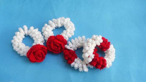 "Crochet gajray/Hand scrunches/Garland  Hello everyone! Today I will teach you some beautiful pattern like gajra, scrunches with jasmine crochet flowers and rose pattern, like the pattern as we work garland,These oversized accessories are colorful, fun, I have a super simple Crochet Scrunches we its gajray version here for you! You will need any of wool double knit medium weight or other you have for both pattern gajray, its can be easily to change any other sizes smaller or baggers’ like it Crochet Scrunches, Jasmine Crochet, Oversized Accessories, Crochet Mens Hat, Thanksgiving Crochet, Crochet Butterfly Pattern, Crochet Beret, Baby Sweater Patterns, Crochet Wedding