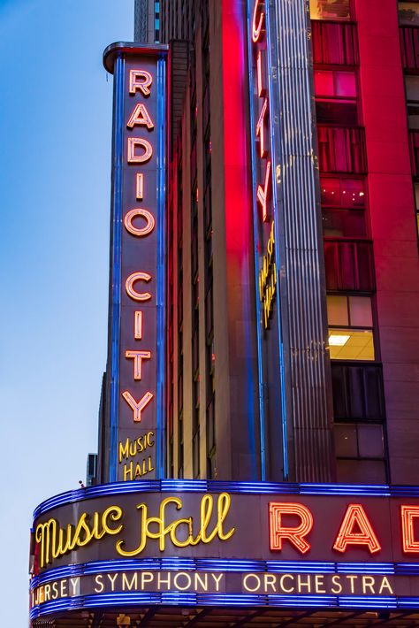 When it first opened, the theater received more acclaim than the performance Art Deco Theater, Ellen Degeneres And Portia, Malibu Beach House, Iconic Architecture, Christmas Spectacular, Warner Music Group, City Block, Metropolitan Opera, Radio City Music Hall