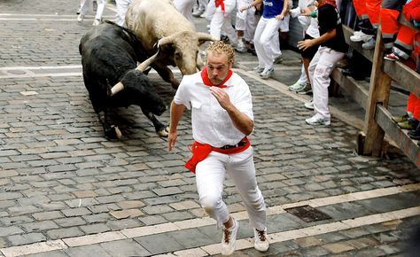 Running from the Bull! Crossfit Memes, Crossfit Humor, Running Of The Bulls, Dangerous Sports, Blue Oyster Cult, Crossfit Motivation, Bull Run, We Are The World, Pamplona