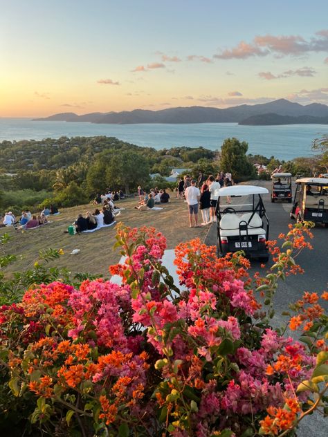 Hamilton island sunset flowers red orange pink floral areangement island life happy hour sunset holiday vacation aesthetic Hamilton Island Aesthetic, Hamilton Island Australia, Sunset Holiday, Grad Trip, Island Aesthetic, Sunset Flowers, Island Sunset, Travel Vibes, Hamilton Island