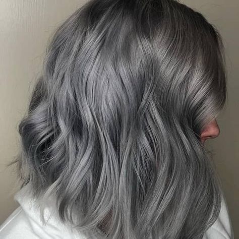 What You Need To Know About The Smoky Hair Color Trend | Hair.com By L'Oréal Charcoal Grey Hair, Dark Grey Hair Color, Dark Silver Hair, Metallic Hair Color, Ash Gray Hair Color, Ash Grey Hair, Charcoal Hair, Silver Ombre Hair, Dark Grey Hair