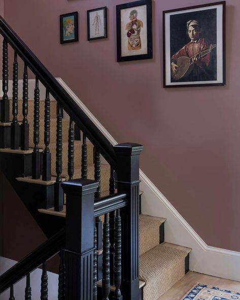 Moody and gorgeous in every light, the star of this space at our Chase Street Project is @farrowandball paint in Sulking Room Pink. Build: Design : @milkandhoneygroup Photo: @jessicadelaneyphotography #designer #design #gc #generalcontractor #newton #massachusetts #chasestreet #project #charming #staircase #victorian #milkandhoneygroup Pink Victorian Hallway, Victorian House Staircase, Sulking Room Pink Hallway, 1930s Staircase, Monochrome Staircase, Colored Staircase, Moody Staircase, Victorian Staircase Ideas, Staircase Victorian