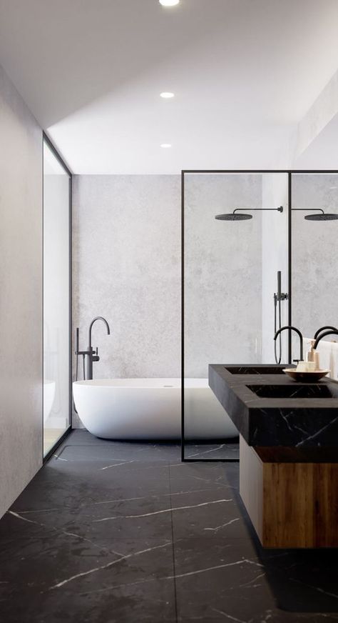 a luxurious minimalist bathroom with a black marble floor and sinks, a wooden vanity and black fixtures that echo with the marble Minimal Bathroom Design, Black Marble Floor, Black Marble Bathroom, Marble Bathroom Floor, Minimal Bathroom, Minimalist Bathroom Design, Bathroom Design Inspiration, Bathroom Design Luxury, Bathroom Decoration