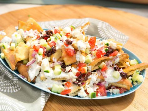 Greek Pita Nachos Recipe | Kelsey Nixon | Food Network Pita Nachos, Greek Nachos, Super Nachos, Kelsey Nixon, Nacho Recipes, Breakfast Nachos, Sausage Ragu, Easy Nachos, Greek Pita