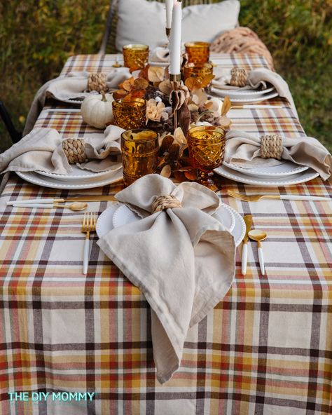 How to Create a Cozy Fall Tablescape on a Budget | The DIY Mommy Diy Mommy, Amber Glassware, Autumn Dining, Plaid Tablecloth, Gold Candle Sticks, Fall Tablescapes, Upcycled Crafts, Fall Decor Diy, Fall Diy