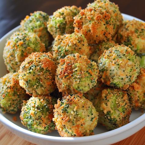 🥦 Turn snack time into a treat with our Broccoli Cheese Balls! Cheesy, crispy, irresistible! #SnackTime Broccoli Cheese Balls Ingredients: Broccoli florets, steamed (2 cups (150 g)) Cheddar cheese, shredded (1 cup (100 g)) Breadcrumbs (1/2 cup (60 g)) Eggs (2) Garlic powder (1 tsp (5 ml)) Salt & pepper to taste Instructions: Chop broccoli finely, mix with cheese, breadcrumbs, eggs, and spices. Form into balls, bake at 400°F (200°C) for 20 minutes. 🍴 Perfect for parties or a nutritious sna... Broccoli Cheese Balls, Broccoli Bites, Cheesy Broccoli, Instagram Recipes, Twisted Recipes, Broccoli Cheese, Cheese Balls, Trending Recipes, Nutritious Snacks