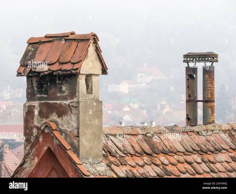 Download this stock image: Old medieval house with red brick roof tiles and a chimney in Sighisoara, Romania. - 2DYNPGJ from Alamy's library of millions of high resolution stock photos, illustrations and vectors. Medieval Chimney, Old Chimney, Sighisoara Romania, Brick Roof, Medieval House, Amsterdam Houses, Ancient Village, Dutch House, Medieval Houses