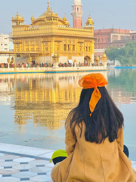 The Golden Temple is a gurdwara located in the city of Amritsar, Punjab, India. It is the preeminent spiritual site of Sikhism. The man-made pool on the site of the temple was completed by the fourth Sikh Guru, Guru Ram Das, in 1577. #goldentemple #amritsar #goldentempleindia #incredibleindia Golden Temple Photo Pose, Golden Temple Amritsar Poses, Traveling Pictures Ideas, Amritsar Photo Ideas, Amritsar Golden Temple Photography, Golden Temple Photography, Golden Temple Aesthetic, Amritsar Photography, Surat Snap