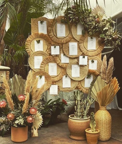 Boho Wedding @shopthreesparrows on IG Boho Wedding Table Names, Boho Entrance Decor Wedding, Tropical Boho Wedding Decor, Boho Wedding Details, Boho Entrance Decor, Wicker Wedding Decor, Boho Wedding Entrance, Boho Seating Chart Wedding, Boho Event Decor