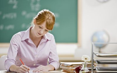 Young teacher sitting in classroom, writing High Functioning, School Psychology, Secondary Education, Spectrum Disorder, Learning Disabilities, Sensory Processing, School Counseling, Teaching Tools, Speech And Language