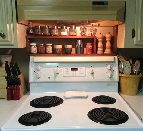 DIY above stove spice rack. Made of 1"x4" spruce. Fits between the cabinets and is hung with 2 stainless bolts on each side for easy removal later. Spice Rack Above Stove, Spice Rack Over Stove, Spice Rack Diy, Stove Spice Rack, Best Spice Rack, Stove Decor, Diy Spice Rack, Spice Racks, Diy Kitchen Storage