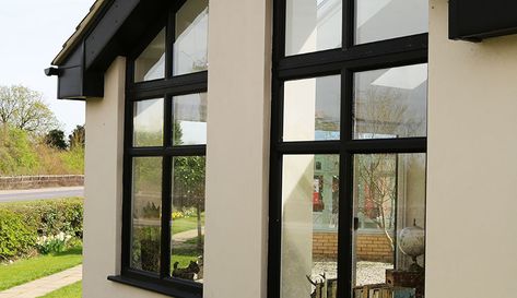 Black colour uPVC windows with bespoke angle shape Black Upvc Windows, Black Aluminium Windows, Windows Upvc, Upvc Windows And Doors, Drafty Windows, Aluminium Windows And Doors, Roof Extension, Timber Windows, Upvc Windows