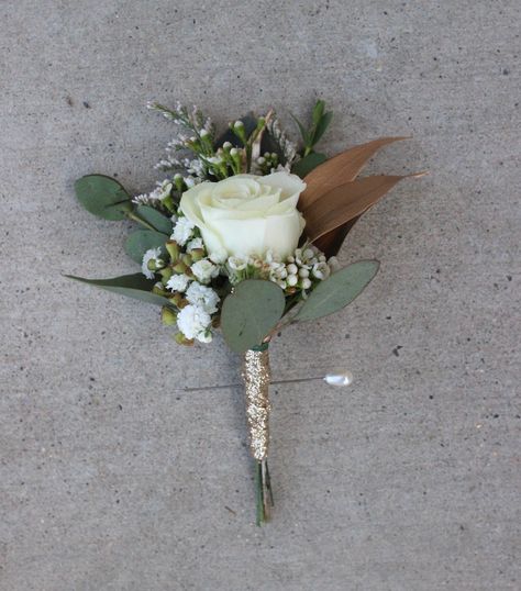 Groom Boutonniere: White spray rose, gold tinted Italian ruscus, eucalyptus, baby's breath, wax flower, white caspia, with glitter Champagne ribbon wrap //Celebration Flair Boutineer Ideas Wedding, Groom Boutonniere White, Boutineer Ideas, White Spray Rose, Champagne Wedding Flowers, Boutonniere White, Wedding Eucalyptus, Simple Wedding Bouquets, White Spray Roses