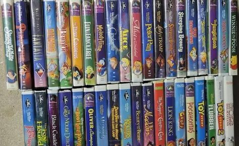 Disney VHS Tapes Can Be Worth up to $6,000 — Check to See If You Have Any - NewsBreak Sleeping Beauty Movie, Vintage Store Ideas, Disney Vhs Tapes, Vcr Player, Aladdin 1992, Song Of The South, Vhs Cassette, Vhs Movie, Video Tapes