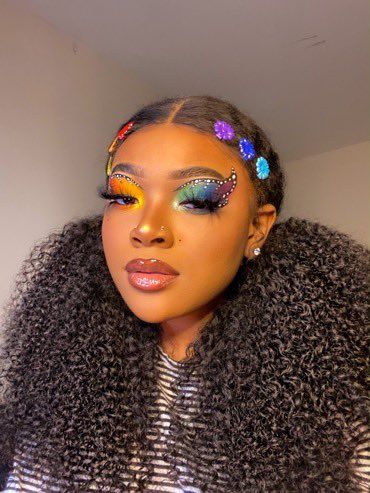 Pride Makeup Black Women, Rainbow Makeup Looks Pride, Rainbow Rhinestone Makeup, Colorful Eyeshadow Black Women, Rainbow Makeup Looks Black Women, Fair Girls, Rainbow Afro Wig, Brown Makeup Looks, Makeup Black Women