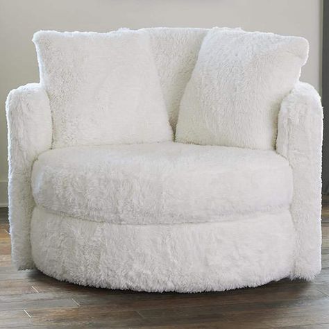 When it comes to versatility this piece meets the demands of the most stylish and sophisticated shoppers. It is designed for the utmost flexibility; it can be placed seamlessly into a casual or a refined setting. | Albany Furniture Fur Swivel Pod Chair in Yakety Yak Natural | Nebraska Furniture Mart Big Fluffy Chair, Cute White Room Decor, Aesthetic Comfy Chair, Big Cozy Chair, Cute Comfy Chairs, Fuzzy Furniture, Cool Chairs For Bedrooms, Cute Chairs For Bedrooms, Ideas For Big Rooms