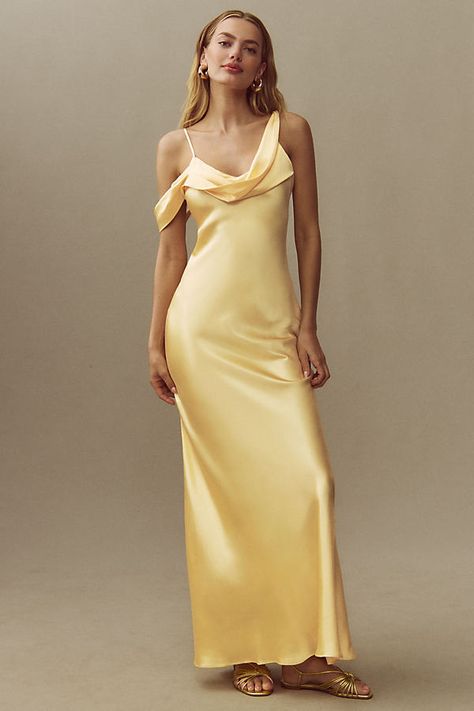 The Reformation Ronda Asymmetrical Cowl-Neck Silk Maxi Dress exudes effortless elegance with its column silhouette, featuring a chic cowl neckline that's enhanced by its luxurious silk charmeuse fabric. | Ronda Asymmetrical Cowl-Neck Silk Maxi Dress by Reformation in Yellow, Women's, Size: 8 at Anthropologie Pastel Yellow Bridesmaid Dresses, Different Bridesmaid Dresses, Silk Yellow Dress, Silk Bridesmaid Dresses, Charmeuse Fabric, The Reformation, Yellow Bridesmaid Dresses, Maid Of Honour Dresses, Affordable Bridesmaid Dresses