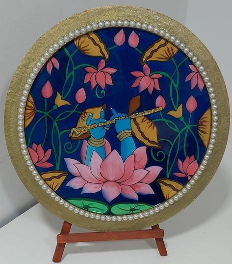 A most loved Hand-Painted wall plate of just Krishna Hands holding flute. Resin finish on top to give a glaze. Beads on ring for embellishment. Perfect for gifting purpose. Housewarming Gift. Flute Wall, Gond Painting, Ganesh Art Paintings, Krishna Flute, Color Drawing Art, Embroidery Wall Art, Customised Gifts, Pichwai Paintings, Beautiful Art Paintings