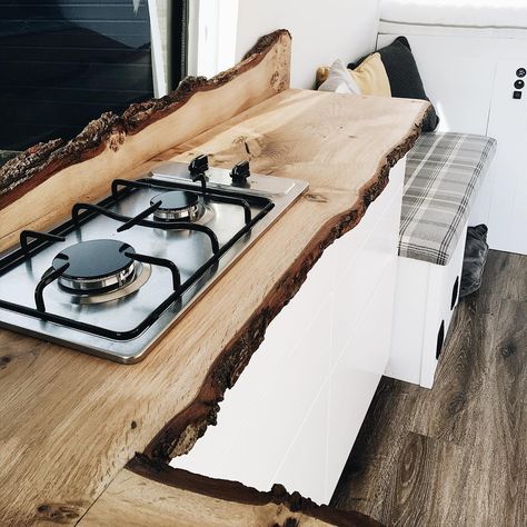 Gorgeous live edge countertop and backsplash in this RV kitchen. Https://www.instagram.com/brownandbird/ Live Edge Countertop, Live Edge Counter, Barbie Kitchen, Mid Size Suv, Metal Tree Wall Art, Metal Tree, Minivan, Ikea Kitchen, Furniture Kitchen