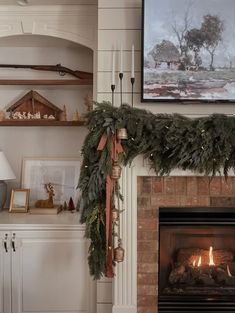 Built In Christmas Decorations, Muted Christmas Ornaments, Vintage Christmas Fireplace Mantle, Garland And Stockings On Fireplace, Christmas Garland Aesthetic, Christmas Craftsman Home, Magee And Co Christmas, Christmas Decorations On Fireplace, Bay Window Garland Christmas