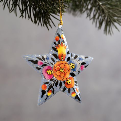 A beautiful addition to any Tree, Cupboard, Dinner Table, or hook! This 3D, 5 Pronged star has been hand carved from Native Indian wood. After which it has been hand painted by artisans in Kashmir India. This star measures approximately 7cm x 7cm. This design is hand painted, slight deviations to the design/colour may naturally occur. Indian Ornaments, Kashmir India, 3d Star, Glass Bauble, Painted Paper, Paper Mache, Hand Blown Glass, Festive Season, Dinner Table