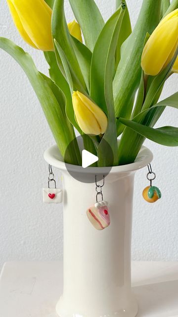 lauren natasha on Instagram: "introducing the charms vase!!! wheel-thrown porcelain with hand-sculpted & painted custom porcelain charms. I’ve been dreaming of bringing these to life for a while and hope you love them as much as I do :-)

a very limited run is now available for pre-order in my webshop 🌷✨🥖🍊🌸💌🍰⭐️" Porcelain Charms, Pretty Pottery, Limited Run, Wheel Thrown, Pre Order, Porcelain, Wheel, Charms, Vase