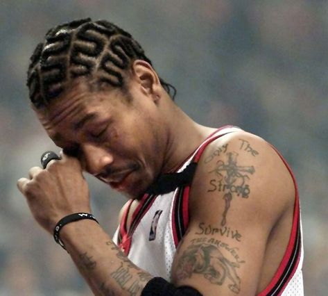 Philadelphia 76ers' guard Allen Iverson rubs his e Allen Iverson Braids, Zig Zag Braids, Iverson Braids, Afro Hair Fade, Cornrow Braids Men, Zig Zag Braid, Hair Twists Black, Cornrow Hairstyles For Men, Basketball Hairstyles