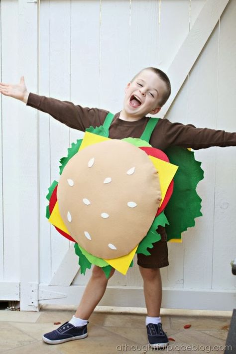 Hamburger Halloween Costume - cardboard from a moving box, fiberfill, hot glue gun, and felt in brown, white, red, yellow, green, and light green Cheeseburger Costume, Pizza Halloween Costume, Hamburger Costume, Baby Carrier Costume, Cotton Candy Costume, Burger Costume, Avocado Costume, Candy Corn Costume, Taco Costume