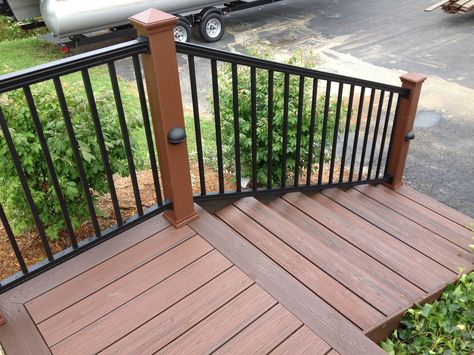 Black Aluminum Railing with Trex Posts, and pathway lighting Vinyl Deck Railing, Aluminum Railing Deck, Deck Skirting, Vinyl Deck, Deck Railing Design, Aluminum Decking, Deck Designs Backyard, Trex Deck, Staining Deck