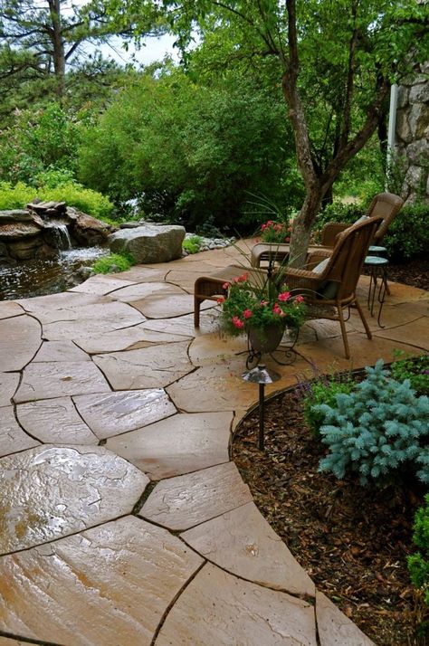 Natural Stone Patio, Flagstone And Grass Patio, Backyard Patio Flagstone, Flagstone Patio Hot Tub, Flagstone Patio With Retaining Wall, Flagstone Raised Patio, Flagstone Patio Design, Concrete Stepping Stones, Flagstone Patio