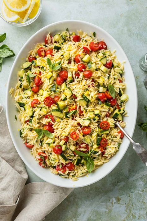 If there's one thing you have to make before summer ends, it's this simple lemon orzo salad. It's full of vibrant flavors and fresh ingredients like crunchy cucumber, juicy tomatoes and bright, beautiful basil - topped with a zesty lemon dressing. Basil Orzo, Lemon Pasta Salads, Simply Whisked, Lemon Orzo Salad, Orzo Salad Recipes, Lemon Orzo, Dairy Free Pasta, Orzo Pasta Salad, Orzo Salad