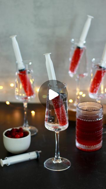 Megan Ruffles on Instagram: "Comment SPOOKY and I’ll send you a direct message with the links to shop and recreate this Halloween party drink!

Simply add Prosecco or sparkling flavored water to a glass then fill each syringe with cranberry juice (my favorite is diet cran raspberry juice).

#halloweencocktail #halloweencocktails #halloweenpartyideas #halloweenpartyfood #halloweenpartydrinks"