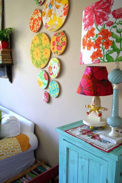 This would be a fun way to bring color in to the bedroom! Koti Diy, Tricia Guild, Fabric Wall Decor, Decoration Shabby, Embroidery Hoop Wall, Decor Studio, Studio Decor, Fabric Wall, Diy Wall Art