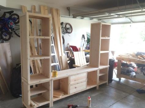 Diy Entertainment Center With Bookshelves, How To Build A Entertainment Center, 2x4 Entertainment Center, Bookshelf Entertainment Center Diy, Entertainment Center Plans, Large Wall Unit Entertainment Center, Diy Entertainment Center Plans, Entertainment Center With Bookshelves, Homemade Entertainment Center