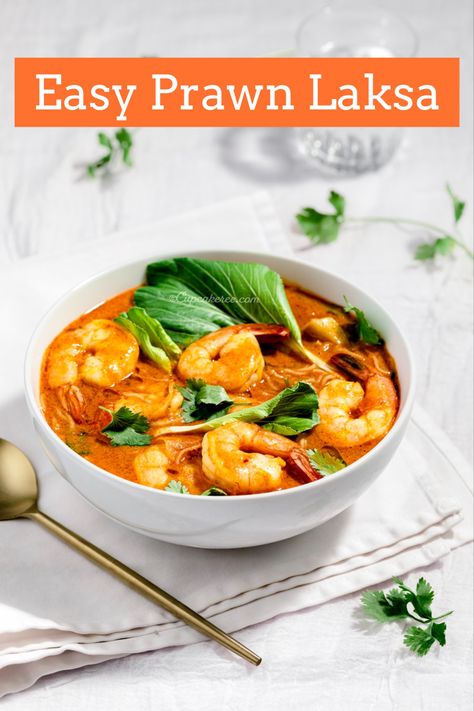 This speedy semi-homemade spicy prawn and noodle soup uses a mix of store-bought curry paste, bouillon cubes and coconut milk. The unusual addition of peanut butter imparts a nutty depth to the flavorful broth. Succulent prawns, rice vermicelli and fresh bok choy add textural contrast, whilst the acidity of lime juice balances the richness. #soup #prawns #prawnrecipes #soupideas #souprecipeseasy #laksa #spicyfood #spicyshrimp #asianfood Laksa Recipe, Laksa Soup, Butter Prawn, Spicy Prawns, Prawn Recipes, Rice Vermicelli, Semi Homemade, Bouillon Cube, Spicy Shrimp