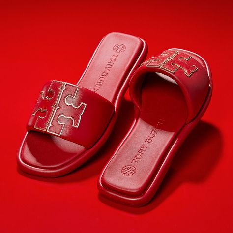 Chic comfort. Our Double T Sport Slide in soft padded leather, with a cushioned foam insole. Luxury Double Strap Slides For Summer, Luxury Sandals With Red Sole, Luxury Designer Red Slides, Red Tory Burch Sandals, Luxury Red Gucci Slides, Luxury Red Slip-on Sandals, Tory Burch Black Sandals, Red Slides, Luxury Stuff