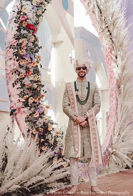 Sana and Sujay, Jammu - WeddingSutra Trendy Wedding Outfits For Men, Nani Costume, Wedding Dresses Groom, Sherwani Groom Wedding, Groom Indian Wedding Outfits, Tropical Vines, Whimsical Backdrop, Indian Wedding Reception Outfits, Wedding Matching Outfits