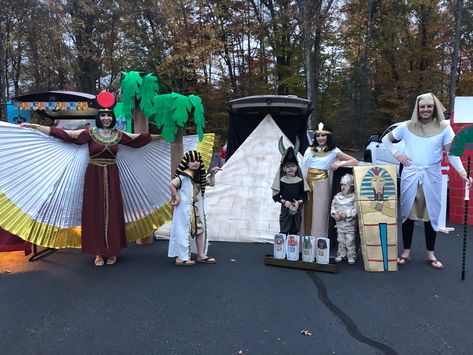 #halloween #trunkortreat #creative #familycostumes #couplecostumes #costume #halloweeninspo #fallaesthetic #autumn #october #hallowseve #originalcostume #handmade #clevercostumes #funnycostumes #kidscostume #family #egyptiancostume #egypt #myths #mythology #egyptiangods #pharoah #cleopatra #isis #horus #anibus #thoth #osiris #fantasy #egyptian #legends #trunk #trickortreat #egyptiantrunk #trunkideas #decorations #pyramidtrunk #egyptiantrunk ... less Egypt Trunk Or Treat, Fantasy Egyptian, Clever Costumes, Autumn October, Funny Costumes, Halloween Inspo, Trunk Or Treat, Family Costumes, Egyptian Gods