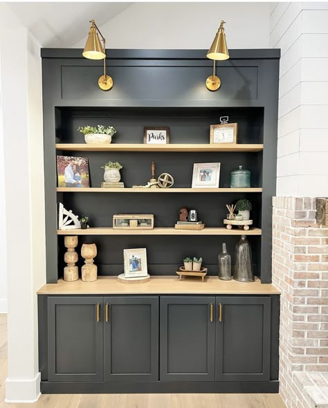 Built Ins With Black Background, Built In Shelves And Cabinets Living Room, Dark Built In Cabinets, Two Tone Built Ins, Iron Ore Built Ins, Black Built Ins Living Room, Room Bookshelf Decor, Family Room Shelves, Living Room Bookshelf Decor