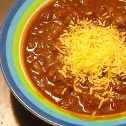 Chili I - Allrecipes.com Bowl Of Chili, Chile Peppers, Homemade Beer, Beef Chili, Spicy Chili, Chili Recipe, Chili Recipes, Shredded Cheese, A Bowl