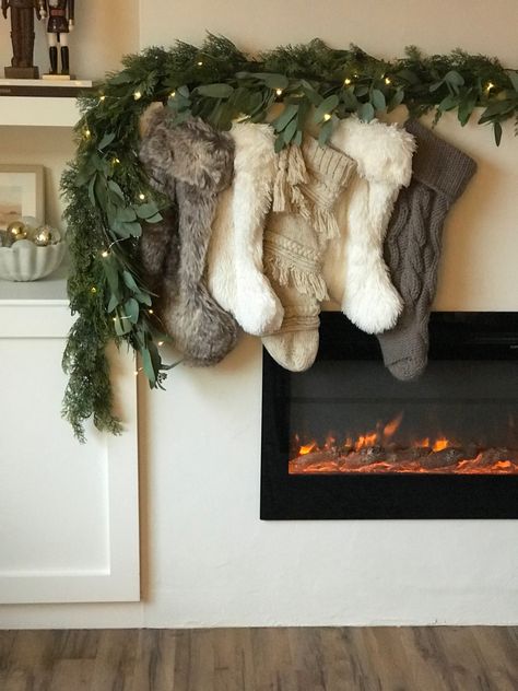 Stockings Hung Without Mantle, Stocking Over Fireplace, Stockings On Electric Fireplace, Stocking Fireplace Ideas, Stockings On Fireplace With No Mantle, Christmas Mantle With Stockings Decor, Hanging Christmas Stocking Ideas, Christmas Stockings No Mantle, Stocking On Mantle