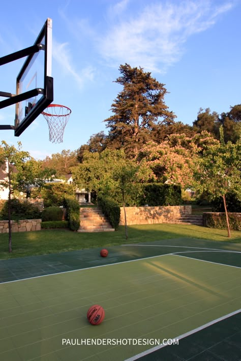 Incorporating a basketball court into a garden backyard, helps keep you healthy by getting you outdoors for a nice game. By Paul Hendershot #landscapedesign #basketball #basketballcourt #garden Basketball Court Garden, House Basketball Court Outdoor, Garden Basketball Court, Outdoor Basketball Court Ideas, Home Basketball Court Outdoor, Basketball Court Outside, Rich Backyard, Goat Castle, Basketball Court Aesthetic